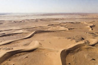 Extreme wide desert landscape with tiny solitary silhouette